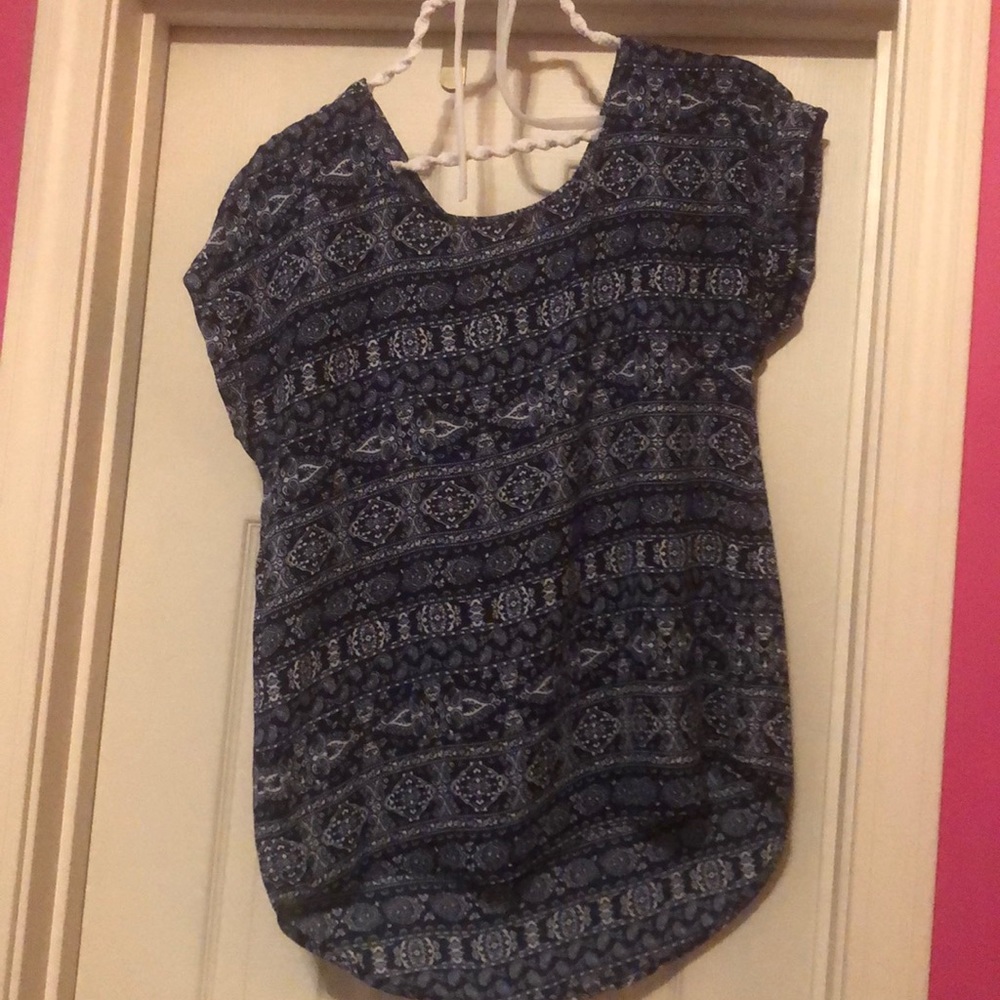 A blue paisley short sleeved shirt.